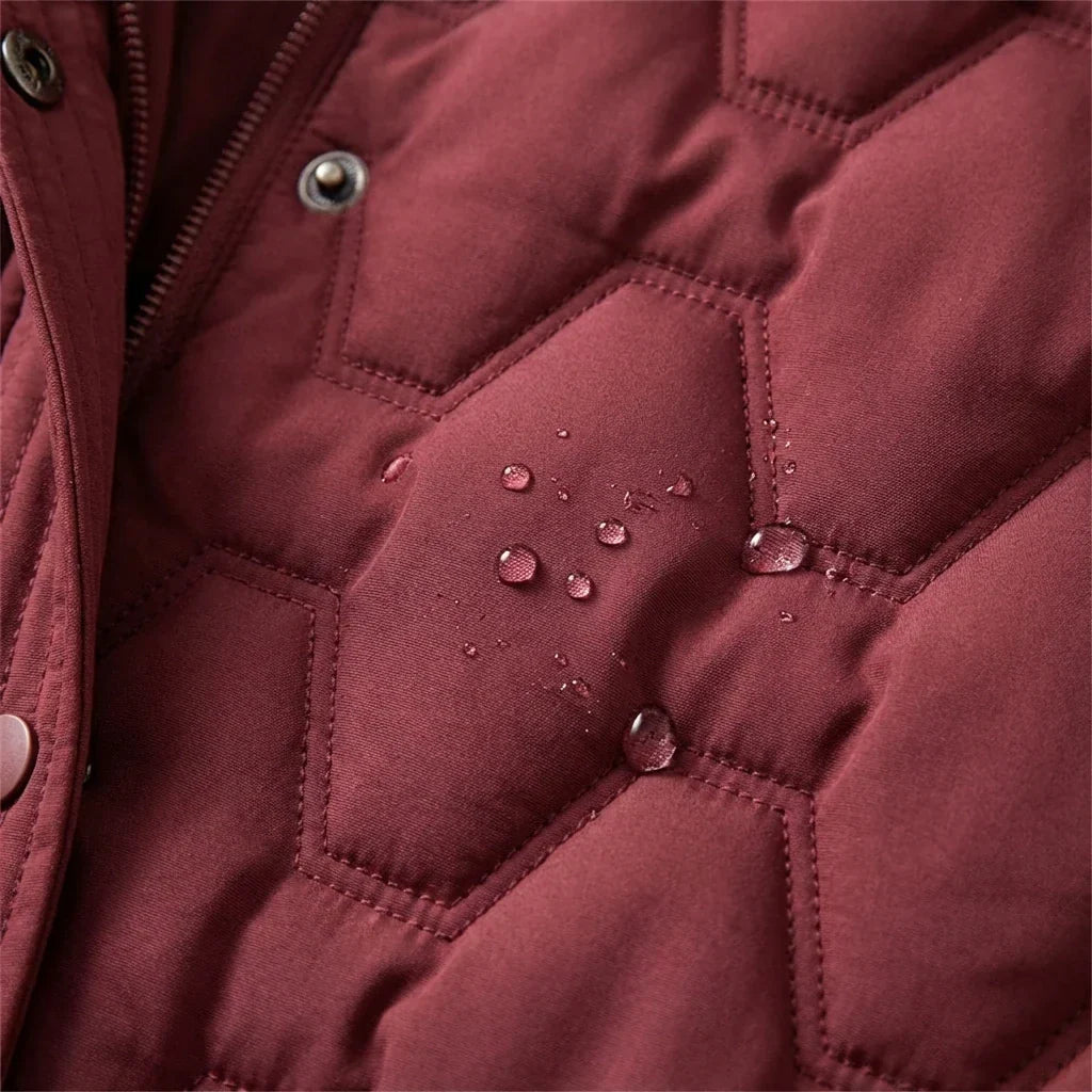 Olivia™ | Lange Gewatteerde Jas met Capuchon